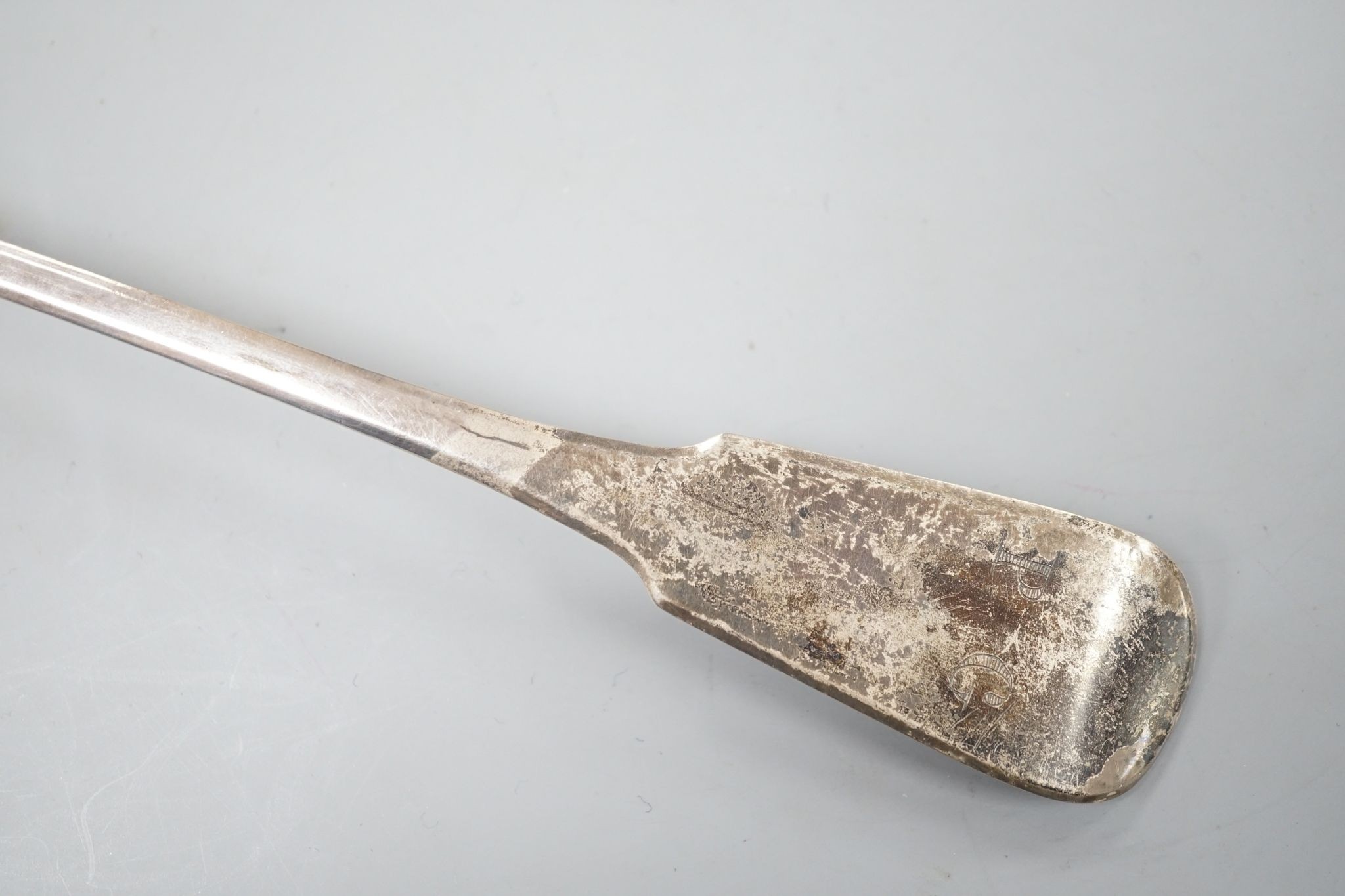 A George III silver fiddle pattern basting spoon, William Seaman, London, 1816, 31.5cm, 109 grams.